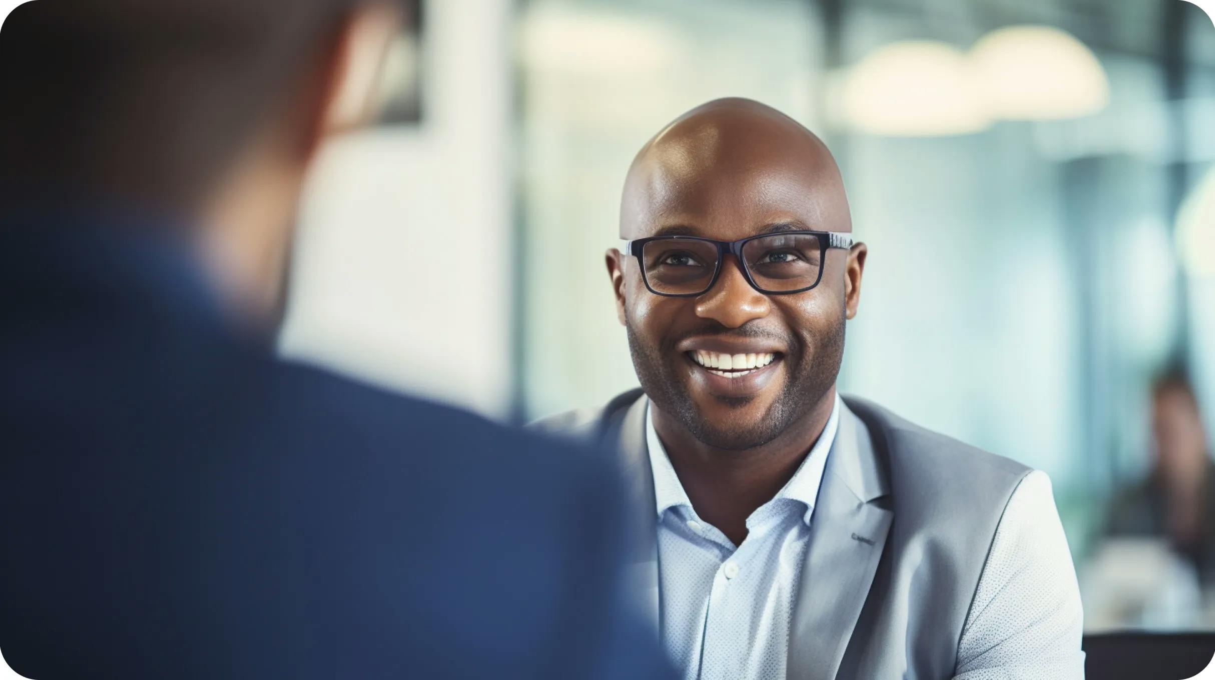 A black entrepreneur talking to a contractor